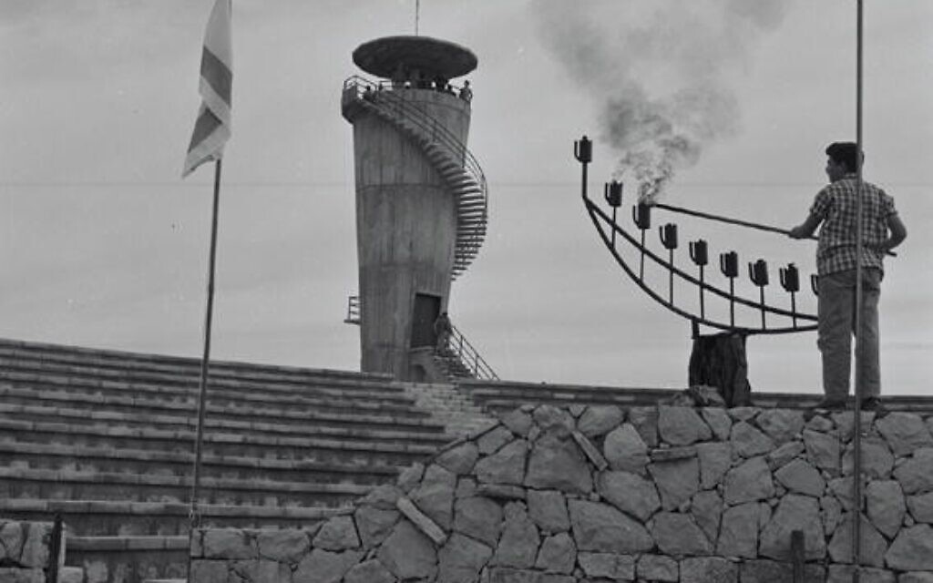 Chanukah-candle-lighting-in-Ben-Shemen-Forest-Mitzpe-Modiin-December-1963.-Photo-credit-Alex-Strajmayster-KKL-JNF-Photo-Archive Chanukah-candle-lighting-in-Ben-Shemen-Forest-Mitzpe-Modiin-December-1963.-Photo-credit-Alex-Strajmayster-KKL-JNF-Photo-Archive