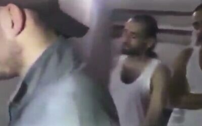 Hostages are seen inside a Hamas tunnel in newly recovered footage released ahead of a broadcast on Israel’s Channel 12. (Screenshot)