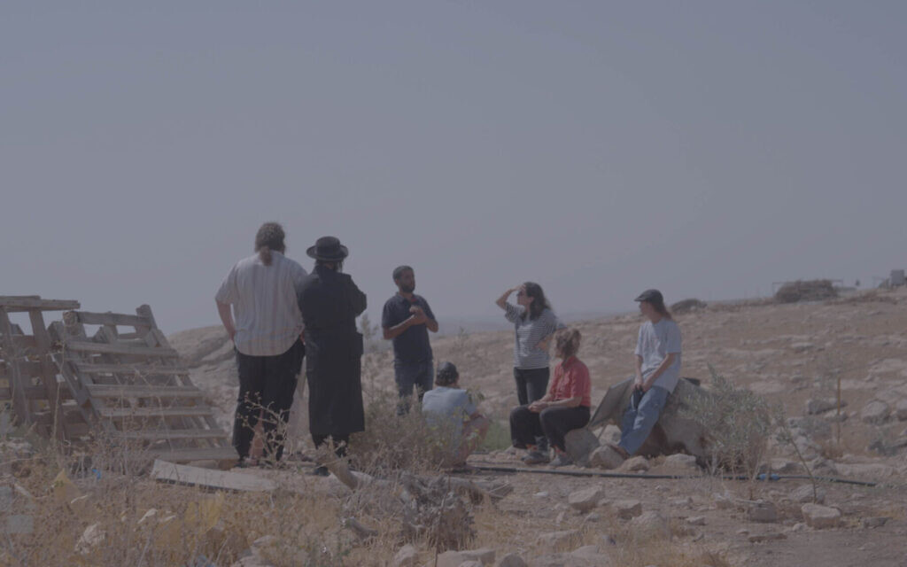 Bnei Avraham volunteers meeting with Palestinian residents during a protective presence visit in the South Hebron Hills. (Photo: Bnei Avraham)