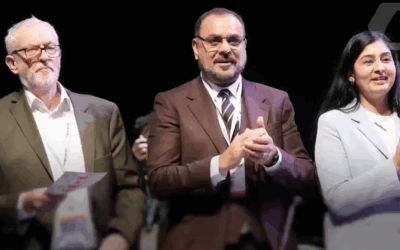Jeremy Corbyn, Ayoub Khan and Zarah Sultana at Your Party's conference 

Photo PA