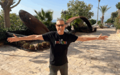 Uri Geller with his record-breaking bent spoon