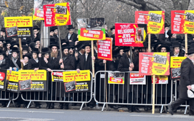 Strictly orthodox Jews protesting outside the Israeli embassy in Kensington today (Picture: Lee Harpin)