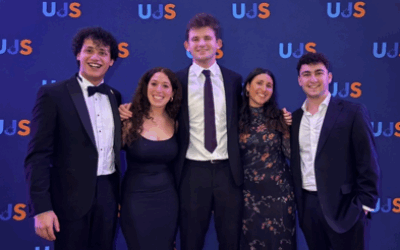 Natasha Spungin (second from left) with other members of the UJS team