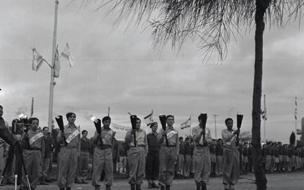 Torch Relay, Chanukah 5710. In Jerusalem 1949. Photo credit- Werner Braun, KKL-JNF Photo Archive Torch Relay, Chanukah 5710. In Jerusalem 1949. Photo credit- Werner Braun, KKL-JNF Photo Archive