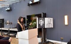 Jasmina Griffoul presents archival photographs during a Limmud Festival session exploring the morally complex story of a Nazi occupation official who helped save a Jewish family.