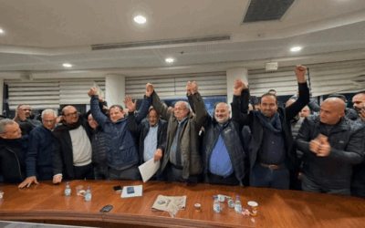 The leaders of the four parties celebrate following the agreement to revive the Joint List
