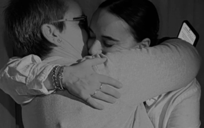 Emily Damari embraces her mother Mandy at a gathering marking one year since her release from captivity.
