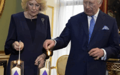 The King and Queen light candles during a reception at Buckingham Palace to mark Holocaust Memorial Day. Photo Credit: The Royal Family The King and Queen light candles during a reception at Buckingham Palace to mark Holocaust Memorial Day. Photo Credit: The Royal Family