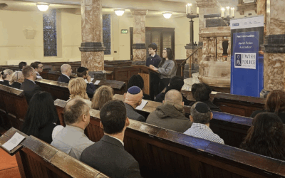 Head boy Harry Patnick and head girl Tamar John of Yavneh College address the audience during the Metropolitan Police Service Holocaust Memorial Day ceremony at Hampstead Synagogue.