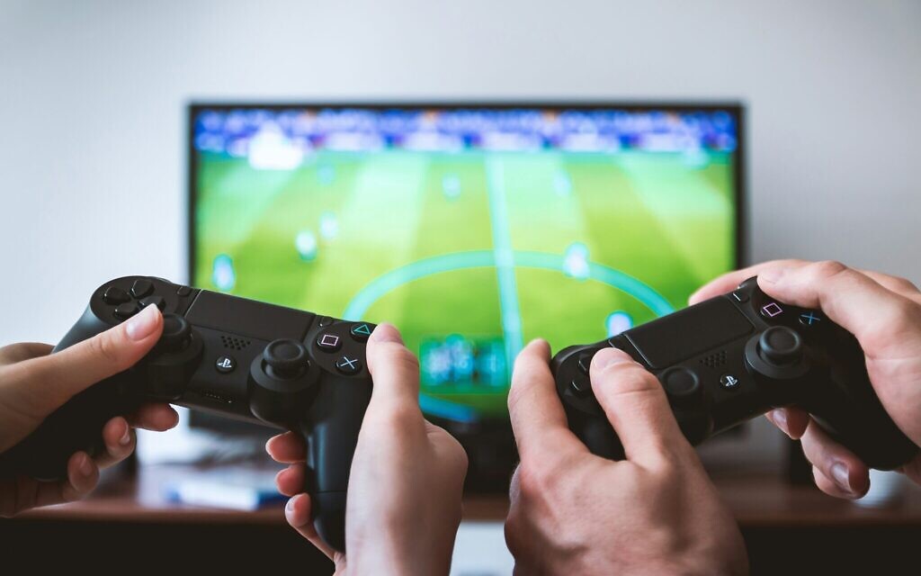 Researchers found antisemitic slang originating in football video games later spread into mainstream online football discourse. Credit:
Jeshoots.com / Unsplash