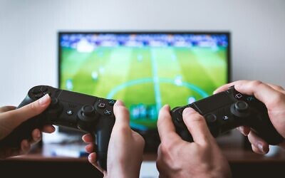 Researchers found antisemitic slang originating in football video games later spread into mainstream online football discourse. Credit:
Jeshoots.com / Unsplash