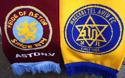 Aston Villa and Maccabi Tel Aviv club badges on a scarf.  Local political pressure may have played a part in the decision to ban Maccabi Tel Aviv football fans from attending a match against Aston Villa, a committee of MPs has concluded.