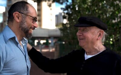 Director Yoav Potash greets Yaacov Goldstein, one of the last Jewish survivors of Gniewoszów, Poland. (Courtesy of 8 Above)