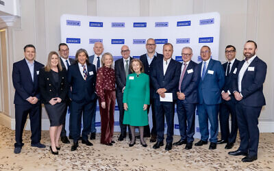 Award-winner-Hannah-Lewis-MBE-with-Topland-Group-Committee-and-Jewish-Care-staff Photos by Grainge Photography