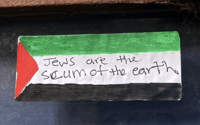 An antisemitic slur displayed on a Palestinian flag, shared by a victim of antisemitism.