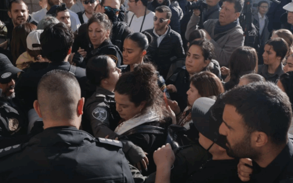 Tammy Gottlieb and Yochi Rappaport being detained by the police (Credit: Women of the Wall)
