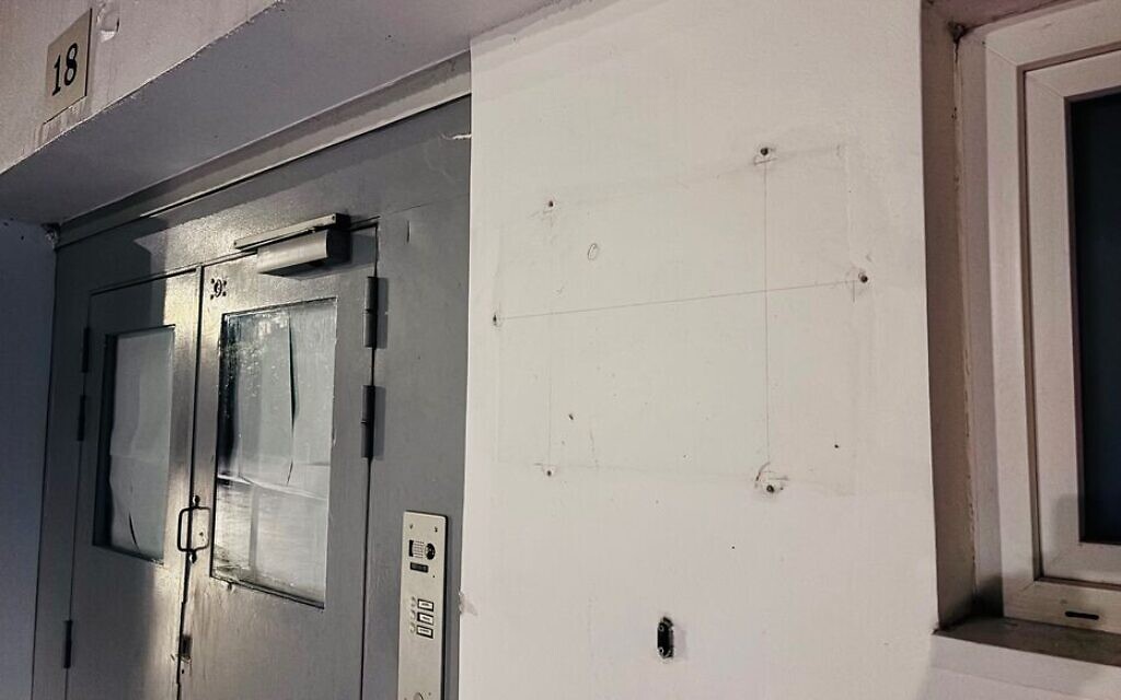 The plaque affixed to the building was torn off and then found in a nearby square (LP/Bertrand Métayer via Le Parisien)