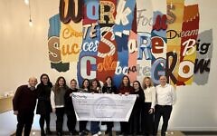 The-Work-Avenue-team-with-their-Charity-Extra-cheque. February 2026 The-Work-Avenue-team-with-their-Charity-Extra-cheque. February 2026