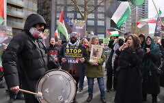 Protesters take part in the annual protest rally by pro-Palestinian group Al Quds, in central London. Picture date: Sunday March 15, 2026.