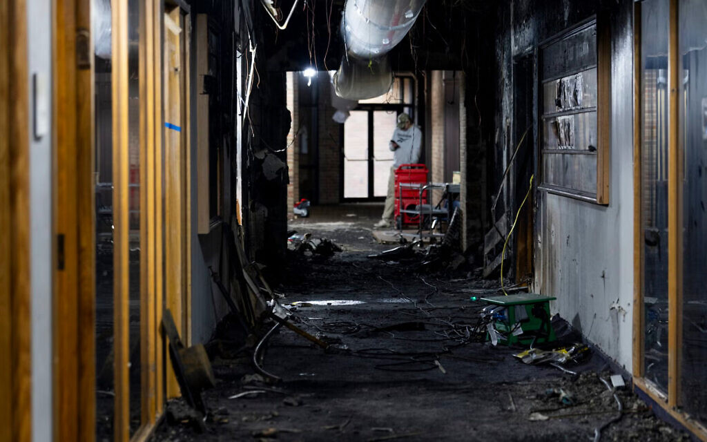 Extensive damage inside the charred hallway at Temple Israel where an attacker drove his vehicle into the building entrance next to the early childhood center last Thursday in West Bloomfield, Michigan, on March 16, 2026. (Emily Elconin)