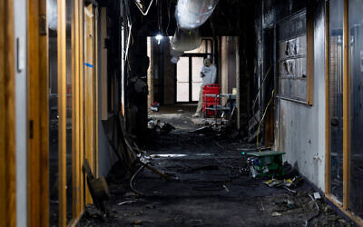 Extensive damage inside the charred hallway at Temple Israel where an attacker drove his vehicle into the building entrance next to the early childhood center last Thursday in West Bloomfield, Michigan, on March 16, 2026. (Emily Elconin)