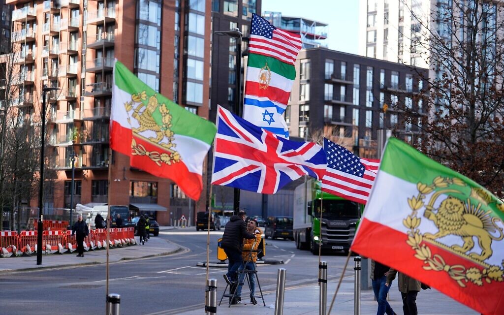 Flags supporting Iranian independence outside the US Embassy in central London. Prime Minister Sir Keir Starmer has allowed the US to strike Iranian missile sites from British bases as officials plan an unprecedented rescue operation for UK citizens in the Gulf. Reports have also suggested the US could use RAF Fairford which can handle American heavy bombers. Picture date: Monday March 2, 2026.