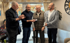 AJEX Honorary President Mike Bluestone awarding veteran Barry Brier his RBL national service medal. L to R Stan Kaye Mike Barry and his Son in Law Peter