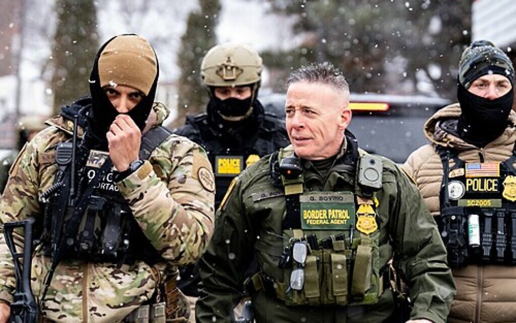 Border Patrol Commander Greg Bovino walks alongside BORTAC officers in Minneapolis on January 22, 2026. Photo: Wikipedia