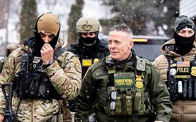 Border Patrol Commander Greg Bovino walks alongside BORTAC officers in Minneapolis on January 22, 2026. Photo: Wikipedia