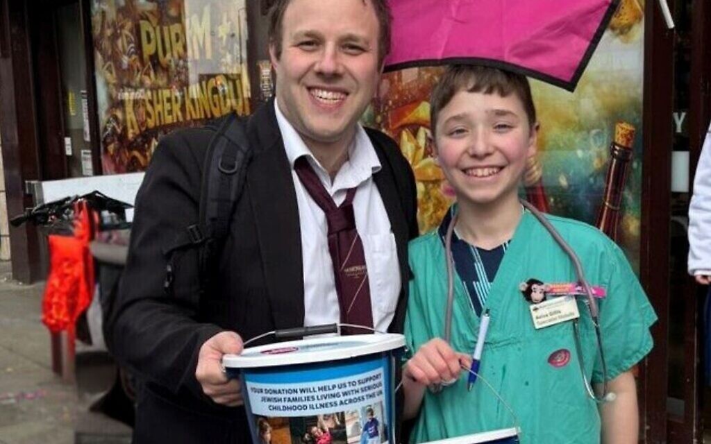 Camp Simcha CEO Daniel Gillis and his son Yishai. Purim 2026 Camp Simcha CEO Daniel Gillis and his son Yishai. Purim 2026