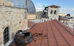 Missile debris rests on a rooftop near the Church of the Holy Sepulchre in Jerusalem’s Old City following an Iranian strike. Credit: Israel/X