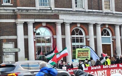 Protesters gather in Hendon as police escort the group away from the area. Photo: Via X