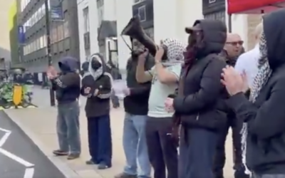 Masked individuals gather near UCL during protest where chants targeting “Zionists” were heard. Credit: X