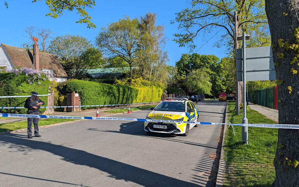 Police officers patrol at a cordon near to an incident at the Kenton United Synagogue in Harrow, north-west London, where an attempted arson attack overnight has caused minor smoke damage to an internal room but no injuries or significant structural damage, the Community Security Trust said. Picture date: Sunday April 19, 2026. PA Photo. Photo credit should read: Jamie Lashmar/PA Wire