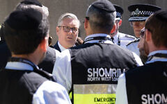 Prime Minister Sir Keir Starmer (centre) and Metropolitan Police Commissioner Sir Mark Rowley (right) meeting first responders from Shomrim North West London during a visit to Golders Green, north west London, following a terror attack on Wednesday morning in which two men were stabbed. Picture date: Thursday April 30, 2026. PA Photo. Police across the country have stepped up patrols in response to the attack that saw two Jewish men - 34-year-old Shilome Rand and 76-year-old Moshe Ben Baila, named locally as Moshe Shine - taken to hospital after being stabbed. Photo credit should read: Stefan Rousseau/PA Wire Prime Minister Sir Keir Starmer (centre) and Metropolitan Police Commissioner Sir Mark Rowley (right) meeting first responders from Shomrim North West London during a visit to Golders Green, north west London, following a terror attack on Wednesday morning in which two men were stabbed. Picture date: Thursday April 30, 2026. PA Photo. Police across the country have stepped up patrols in response to the attack that saw two Jewish men - 34-year-old Shilome Rand and 76-year-old Moshe Ben Baila, named locally as Moshe Shine - taken to hospital after being stabbed. Photo credit should read: Stefan Rousseau/PA Wire