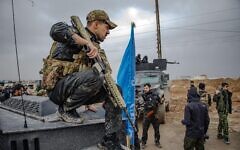 Kurdish Internal Security Forces, known as "Asayish," stand guard as Syrian government internal security personnel enter the northeastern city of Hasakeh, a Kurdish stronghold, on February 2, 2026. The entry follows a January 30 integration deal to gradually merge Kurdish military and civilian institutions into the state, after weeks of territorial ceding to advancing government troops amid months of sporadic conflict between the two sides. (Photo by Amjad Kurdo/Middle East Images/StringersHub/Sipa USA) Credit: Sipa US/Alamy Live News Kurdish Internal Security Forces, known as "Asayish," stand guard as Syrian government internal security personnel enter the northeastern city of Hasakeh, a Kurdish stronghold, on February 2, 2026. The entry follows a January 30 integration deal to gradually merge Kurdish military and civilian institutions into the state, after weeks of territorial ceding to advancing government troops amid months of sporadic conflict between the two sides. (Photo by Amjad Kurdo/Middle East Images/StringersHub/Sipa USA) Credit: Sipa US/Alamy Live News