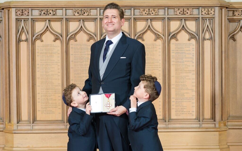 Neil Martin after receiving his CBE from King Charles III