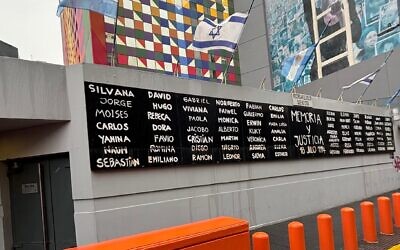 Names of those killed in the 1994 attack on the AMIA Jewish center, which left 85 dead and 300 injured, mark the front of the AMIA Center in Argentina. (Juan Melamed)
