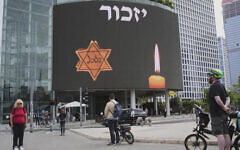 Israelis observe a two-minute to mark Yom HaShoah. Photo: X Israelis observe a two-minute to mark Yom HaShoah. Photo: X