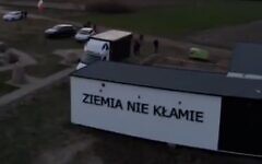 A container installed near the site of the Jedwabne pogrom proclaims in Polish, "The earth doesn't lie." The container, installed in April 2026, promotes the narrative that Nazis, not Poles, killed the Jews of Jedwabne in 1941. (Screenshot) A container installed near the site of the Jedwabne pogrom proclaims in Polish, "The earth doesn't lie." The container, installed in April 2026, promotes the narrative that Nazis, not Poles, killed the Jews of Jedwabne in 1941. (Screenshot)