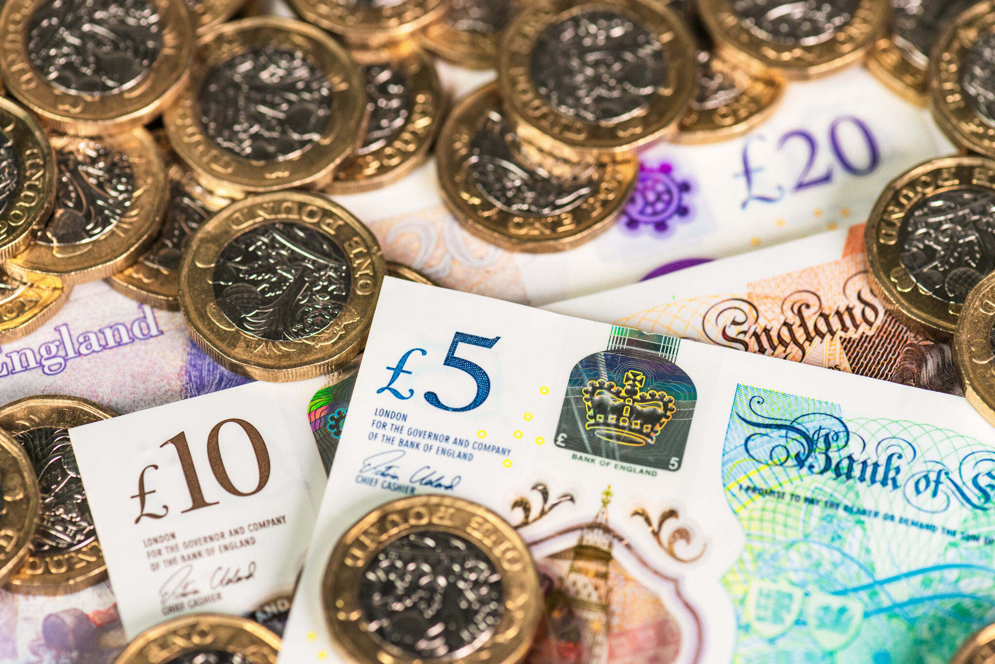 Pound slides as resilient shekel strengthens