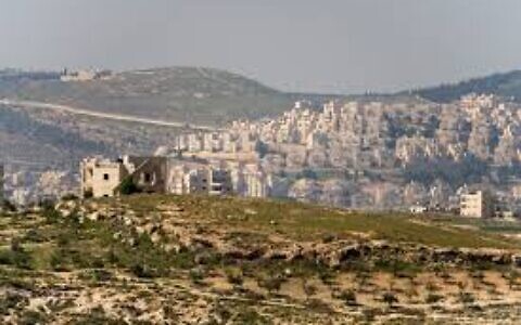 An Israeli settlement overlooks the West Bank landscape. Photo: Wikipedia
