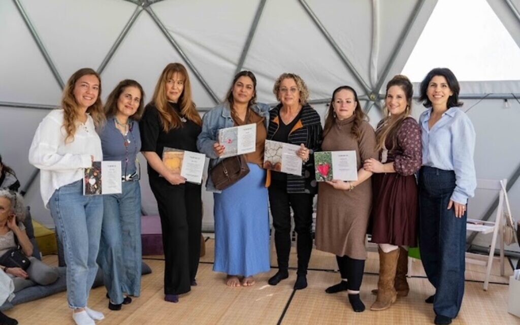 Anat Meir, Curator Sigalit Zilkha Niewodowski, Iris Halfon, Nofar Avraham, Hagit Sela, Rachel Brosh Yunes, author Hadassa Ben Ari, heart photographer Eti Karo Abecassis  at the opening event at the Forest of Possibilities in Petah Tikva.  Photo: Noy Naftali