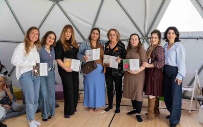Anat Meir, Curator Sigalit Zilkha Niewodowski, Iris Halfon, Nofar Avraham, Hagit Sela, Rachel Brosh Yunes, author Hadassa Ben Ari, heart photographer Eti Karo Abecassis  at the opening event at the Forest of Possibilities in Petah Tikva.  Photo: Noy Naftali