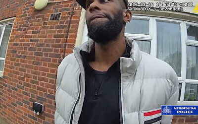 Undated handout screengrab from body worn footage issued by Metropolitan Police of the arrest of Tavius Jean Charles who has been jailed for five years after admitting religiously aggravated threatening behaviour.