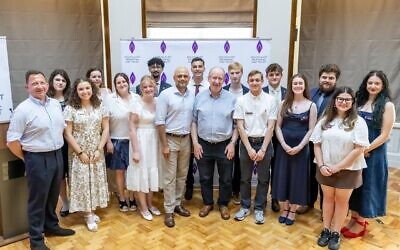 Graduates of the Holocaust Memorial Day Trust’s inaugural Next Gen Ambassador Programme pictured with Sir Sajid Javid and Daniel Finkelstein at the graduation ceremony in central London. Credit: Holocaust Memorial Day Trust/Grainge Photography.