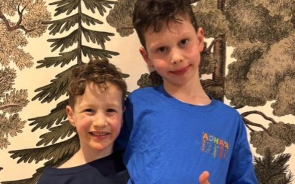 Nate Zilberkweit Lewy (right) wearing ADHAA clothing, the neurodiversity-focused brand he launched to promote positive perceptions of ADHD.