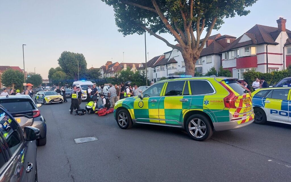 Emergency services, including Hatzola, Shomrim and Metropolitan Police officers, at the scene of the collision on Golders Green Road on Wednesday night. Credit: Shomrim/X