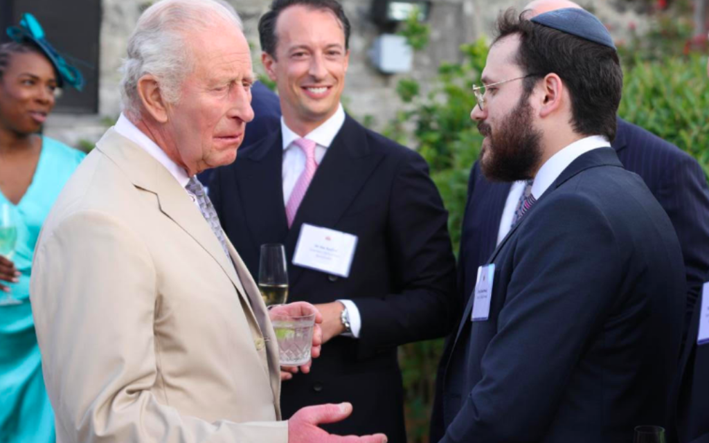 King Charles speaks with Rabbi Chaim Birnhack during visit to Bermuda