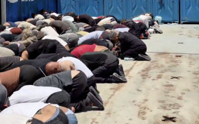 Activists detained after attempting to breach Israel’s Gaza blockade kneel at Ashdod port in footage shared online by Itamar Ben-Gvir.